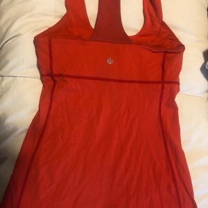 Lululemon tank and 2 Nike tanks